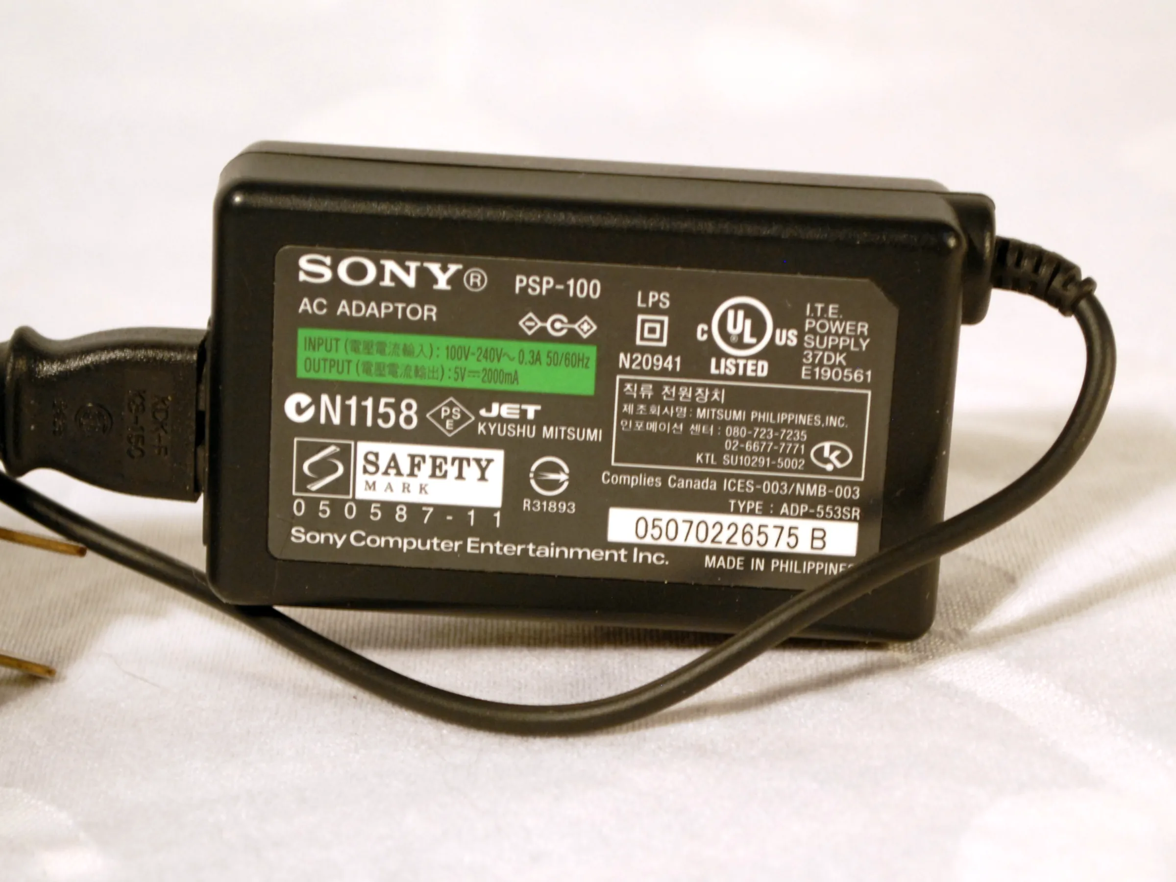 Adapter Sony PSP-100 label